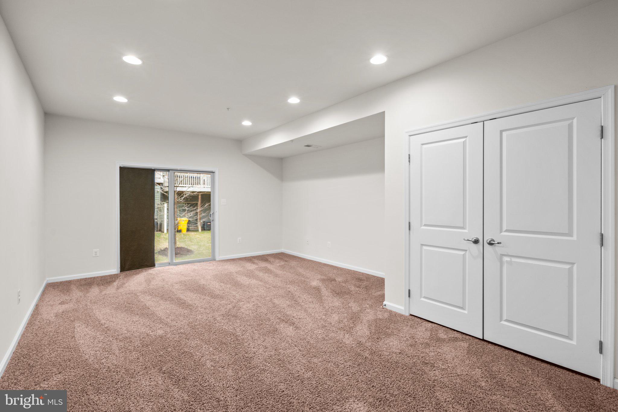 7345 Old Calvary Road Hanover, MD 21076 - Photo 25 of 44 Expansive rec room w/walk-out to rear yard