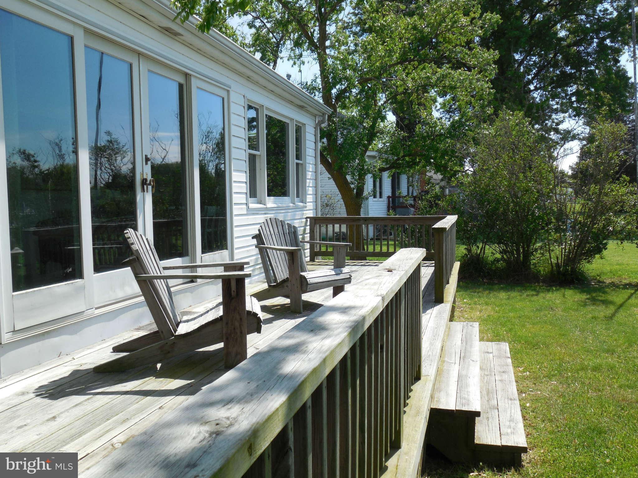 1520 Deep Point Road Woolford, MD 21677 - Photo 2 of 29 a view of deck with furniture