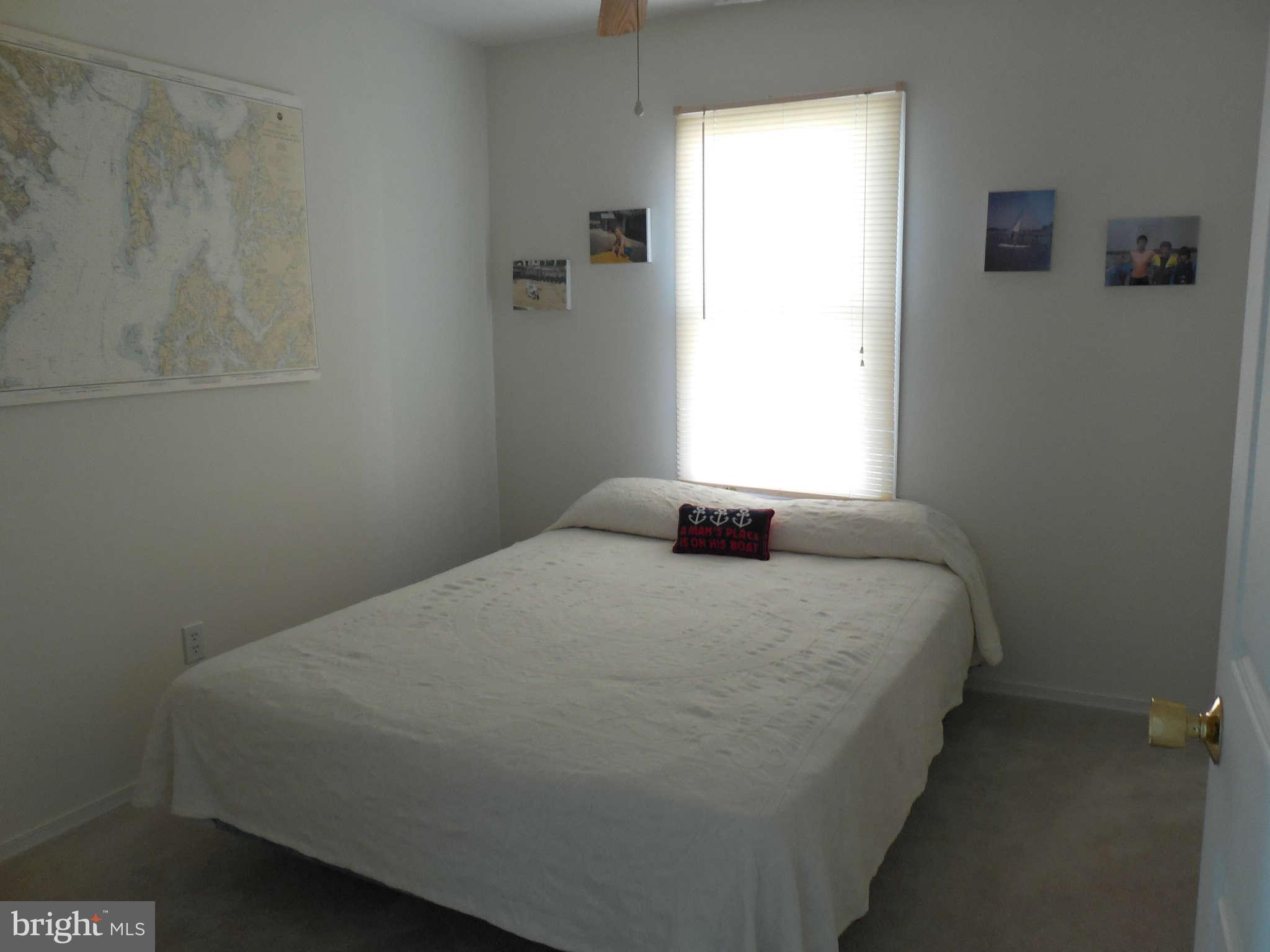 1520 Deep Point Road Woolford, MD 21677 - Photo 28 of 29 a bedroom with a bed and a window