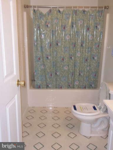 1520 Deep Point Road Woolford, MD 21677 - Photo 10 of 29 a bathroom with a toilet and a shower