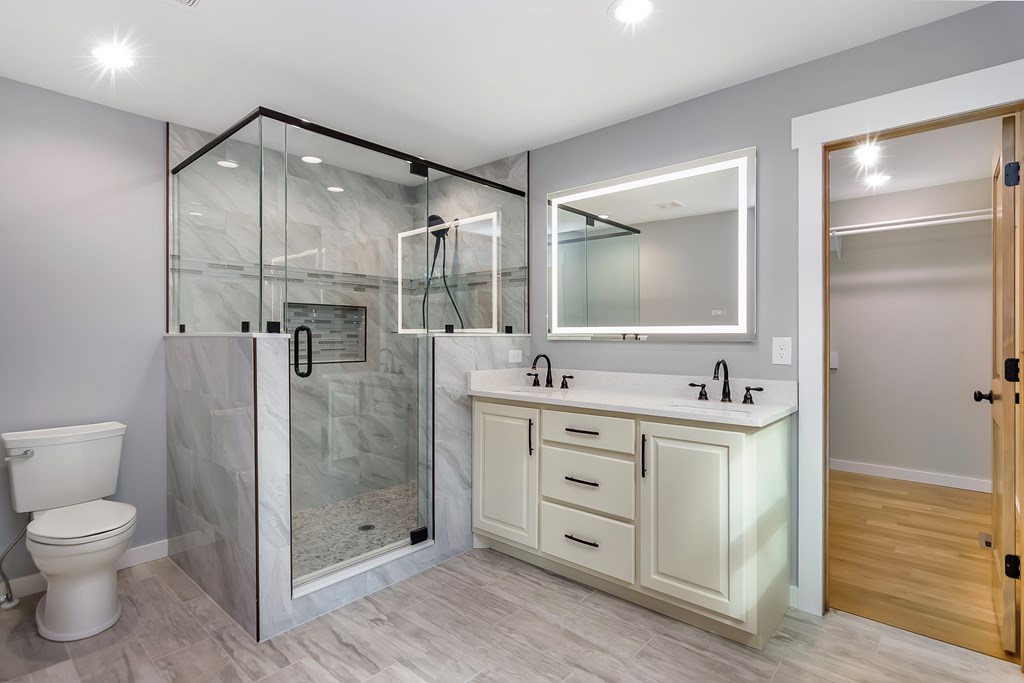 105 West Riveredge Drive Ellijay, GA 30536 - Photo 29 of 56 a bathroom with a sink a toilet and shower