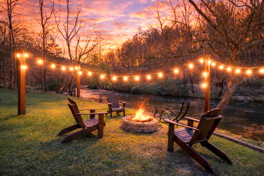 105 West Riveredge Drive Ellijay, GA 30536 - Photo 3 of 56 a view of a backyard with sitting area