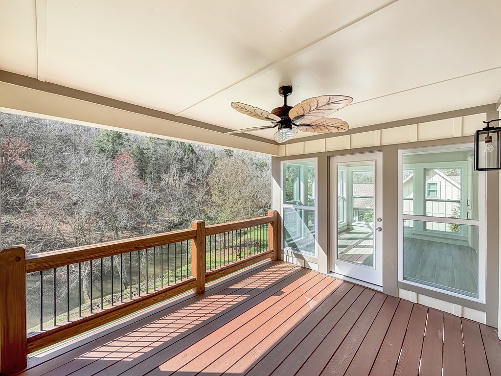 105 West Riveredge Drive Ellijay, GA 30536 - Photo 34 of 56 a view of a balcony with wooden floor