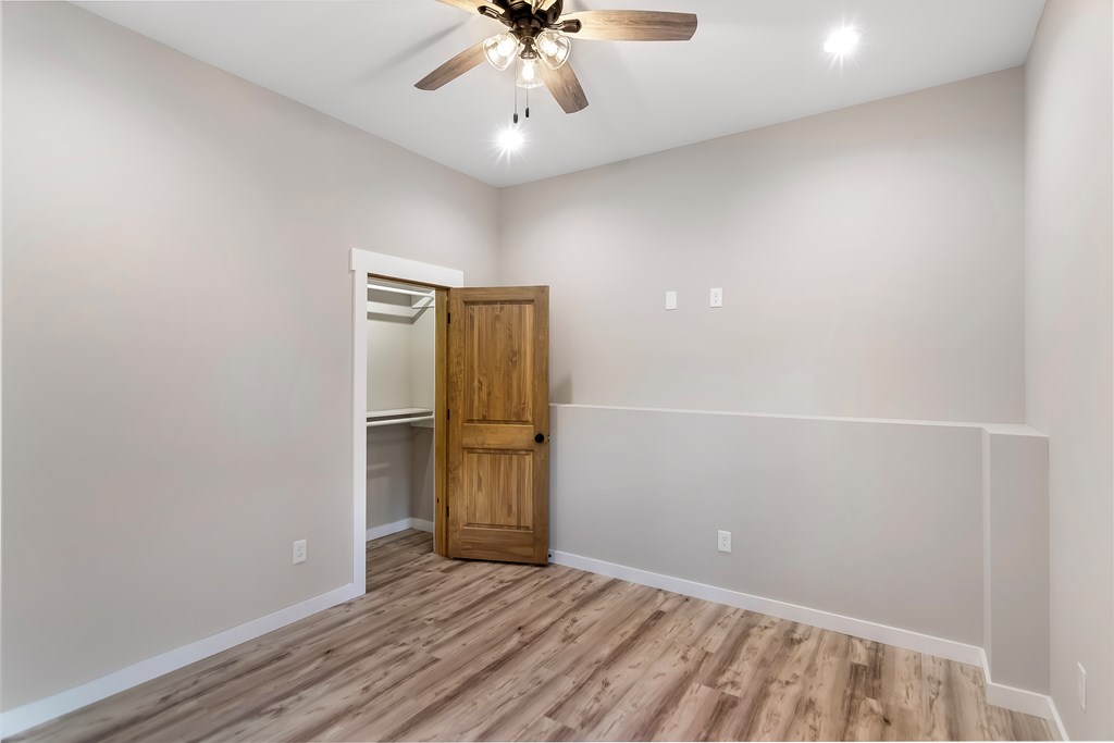 105 West Riveredge Drive Ellijay, GA 30536 - Photo 49 of 56 wooden floor in an empty room with a window
