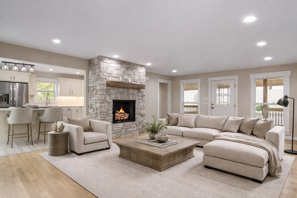 105 West Riveredge Drive Ellijay, GA 30536 - Photo 10 of 56 a living room with furniture and a fireplace