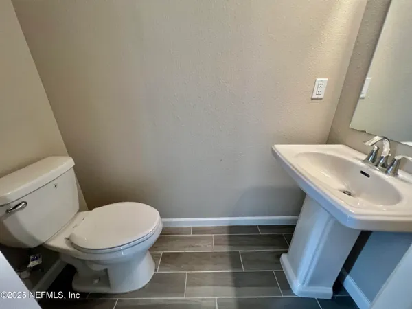 a bathroom with a sink and a toilet