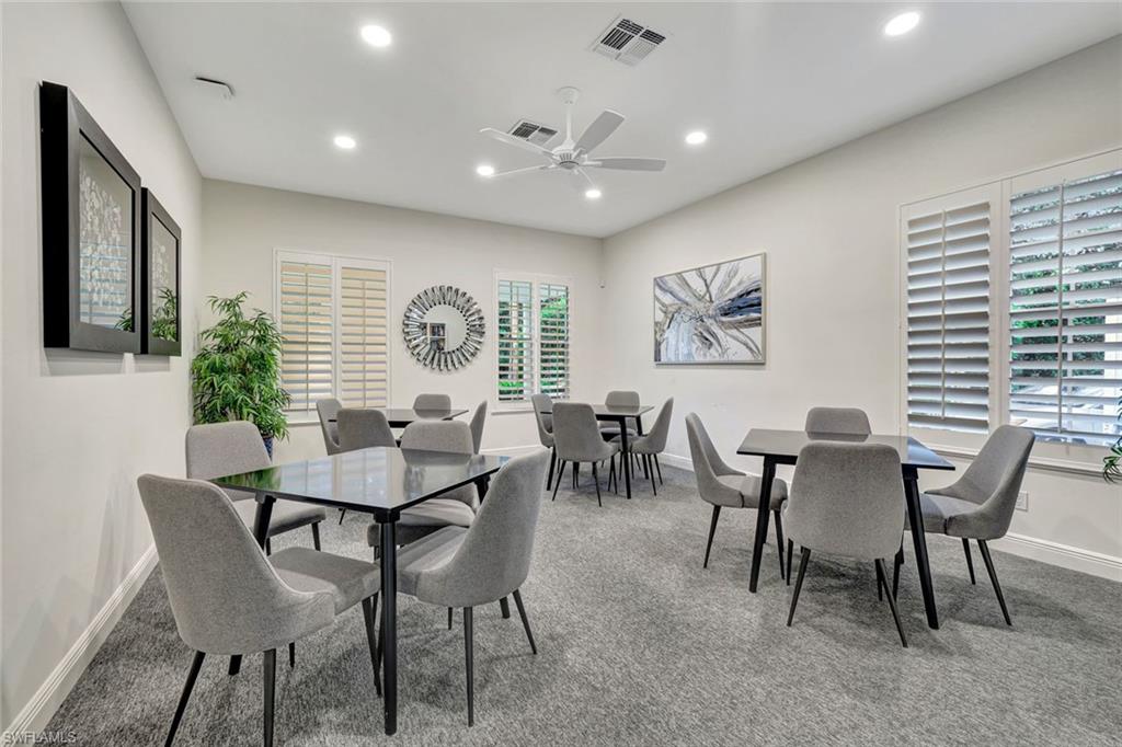 2540 Talon Court, Unit 504 Naples, FL 34105 - Photo 27 of 31 Dining space with recessed lighting, light colored carpet, and ceiling fan