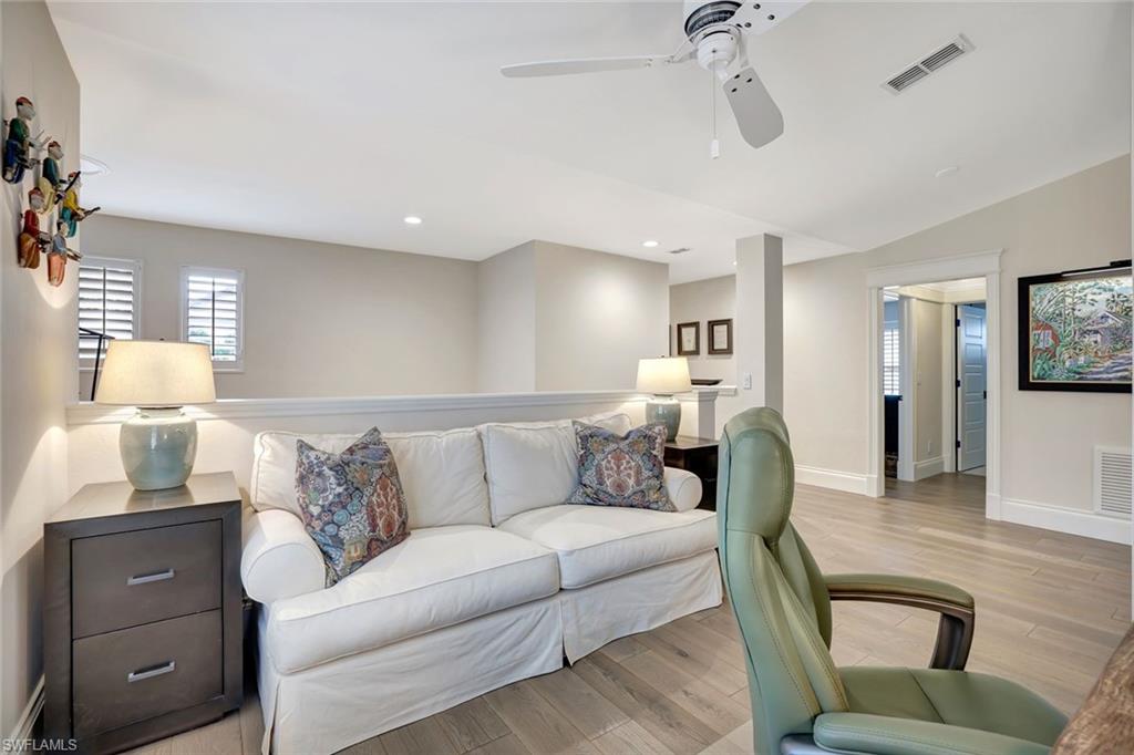 2540 Talon Court, Unit 504 Naples, FL 34105 - Photo 6 of 31 Den-Office with ample space for a sleeper sofa, plantation shutters on windows.