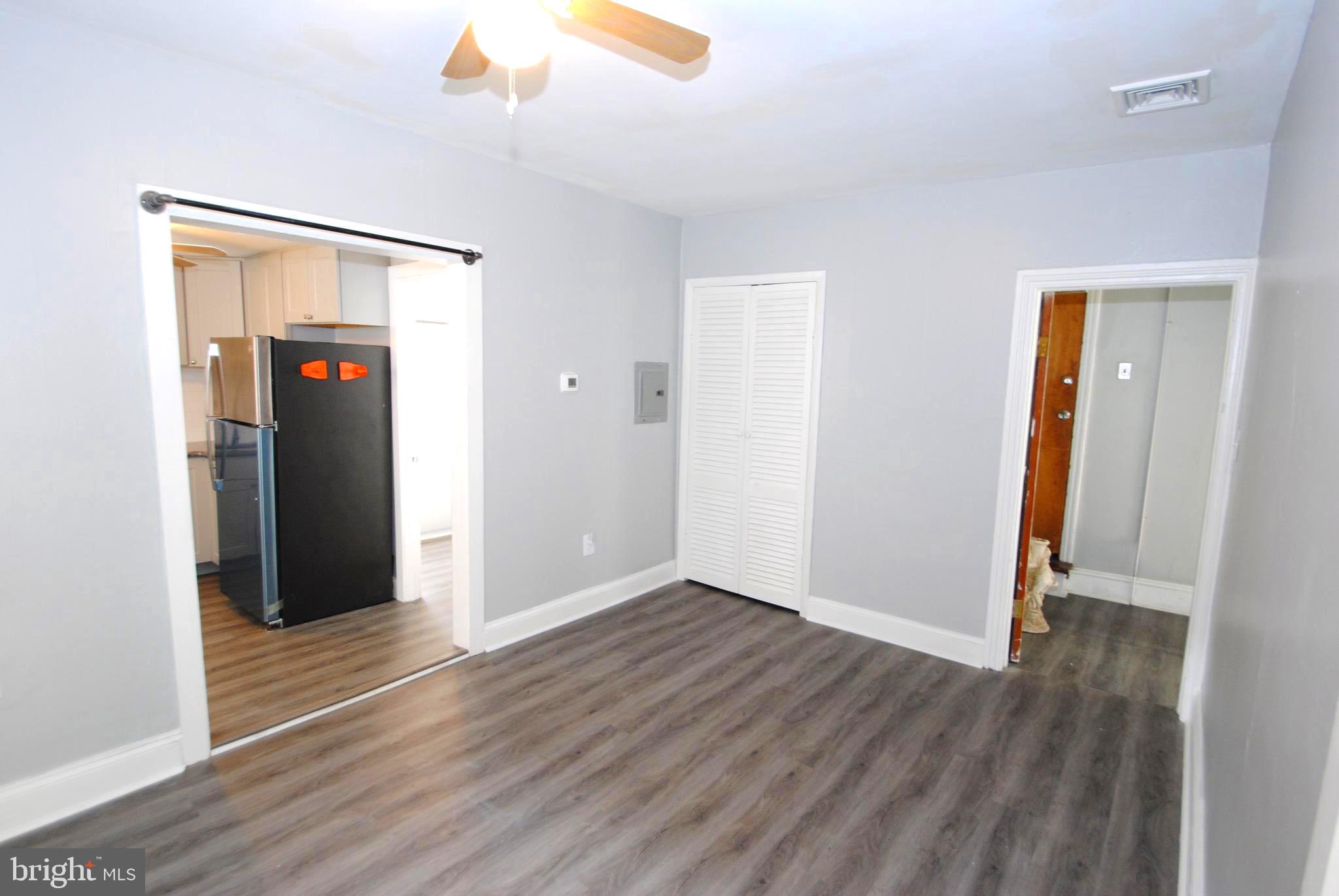 374 Farnsworth Avenue Bordentown, NJ 08505 - Photo 5 of 7 wooden floor in an empty room with a window