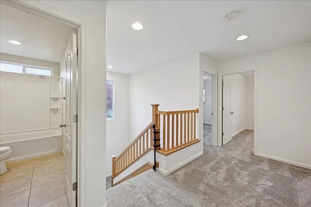 a view of a hallway with entryway