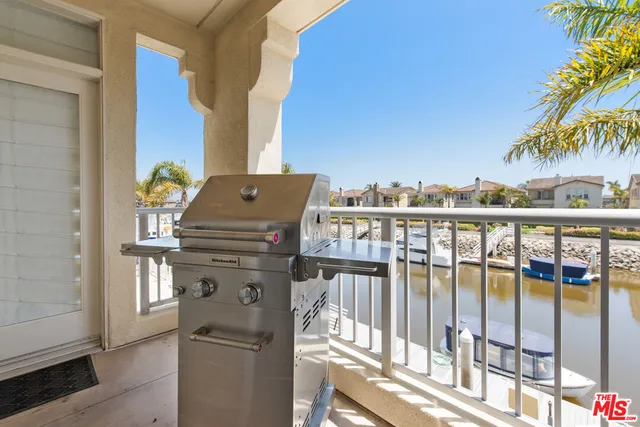 a view of balcony with furniture