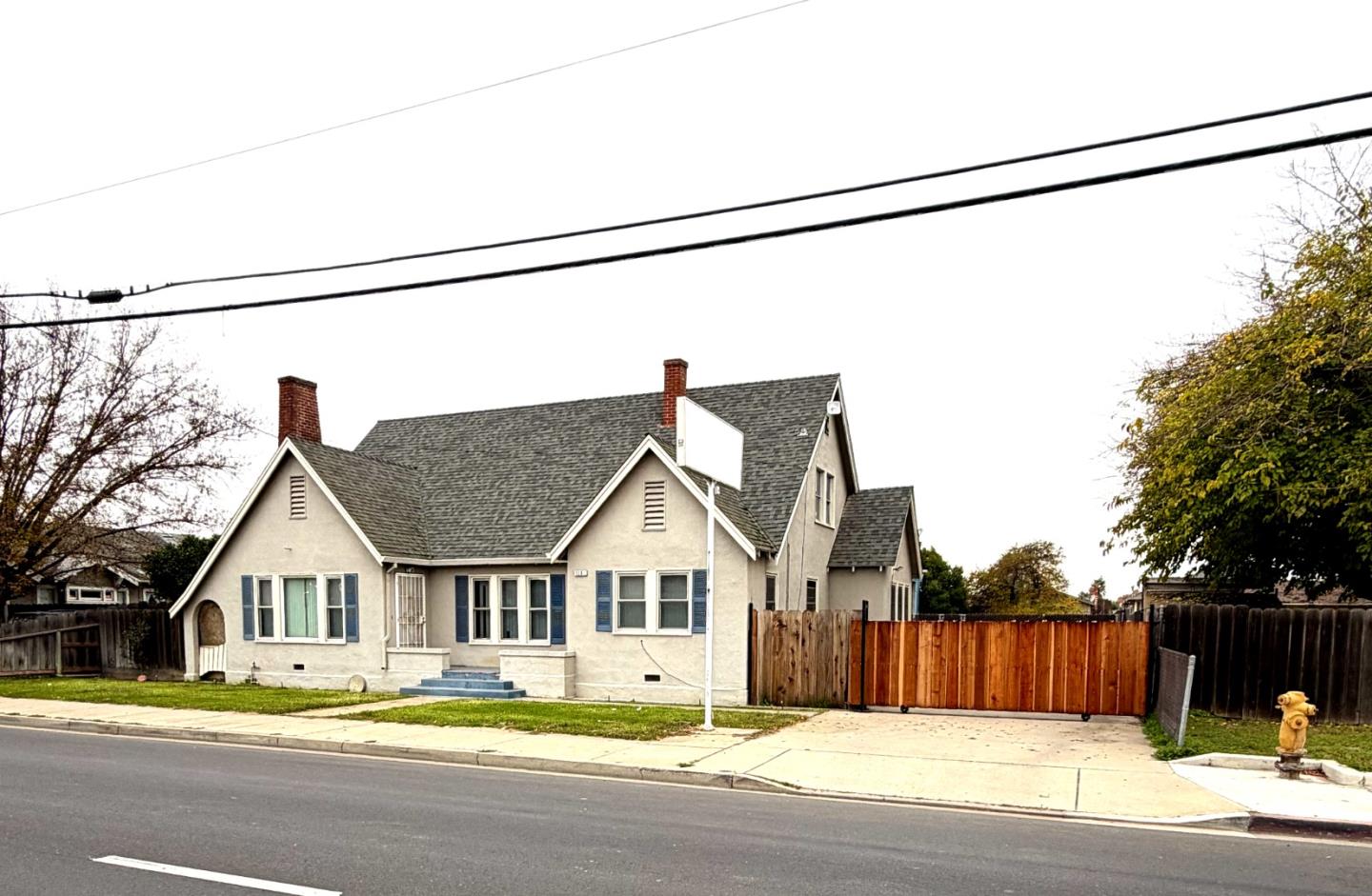 1291 Lander Avenue Turlock, CA 95380 - Photo 1 of 1 a view of a house next to a road