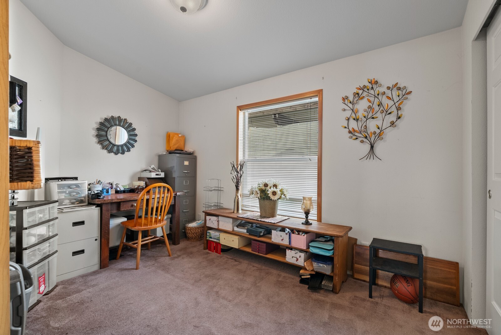 9314 Canyon Road East, Unit 39 Puyallup, WA 98371 - Photo 22 of 27 a bedroom with furniture and a window