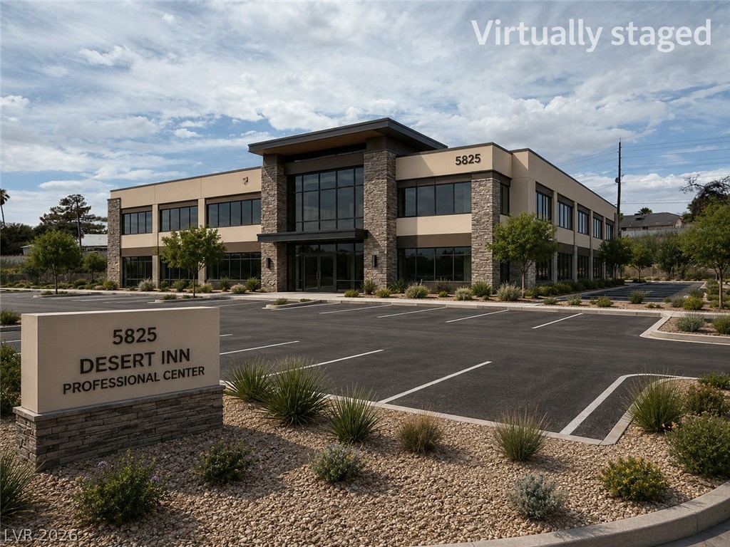 5825 West Desert Inn Road Las Vegas, NV 89146 - Photo 3 of 8 A contemporary commercial building with stone and stucco accents offers abundant parking and well-maintained xeriscaping.