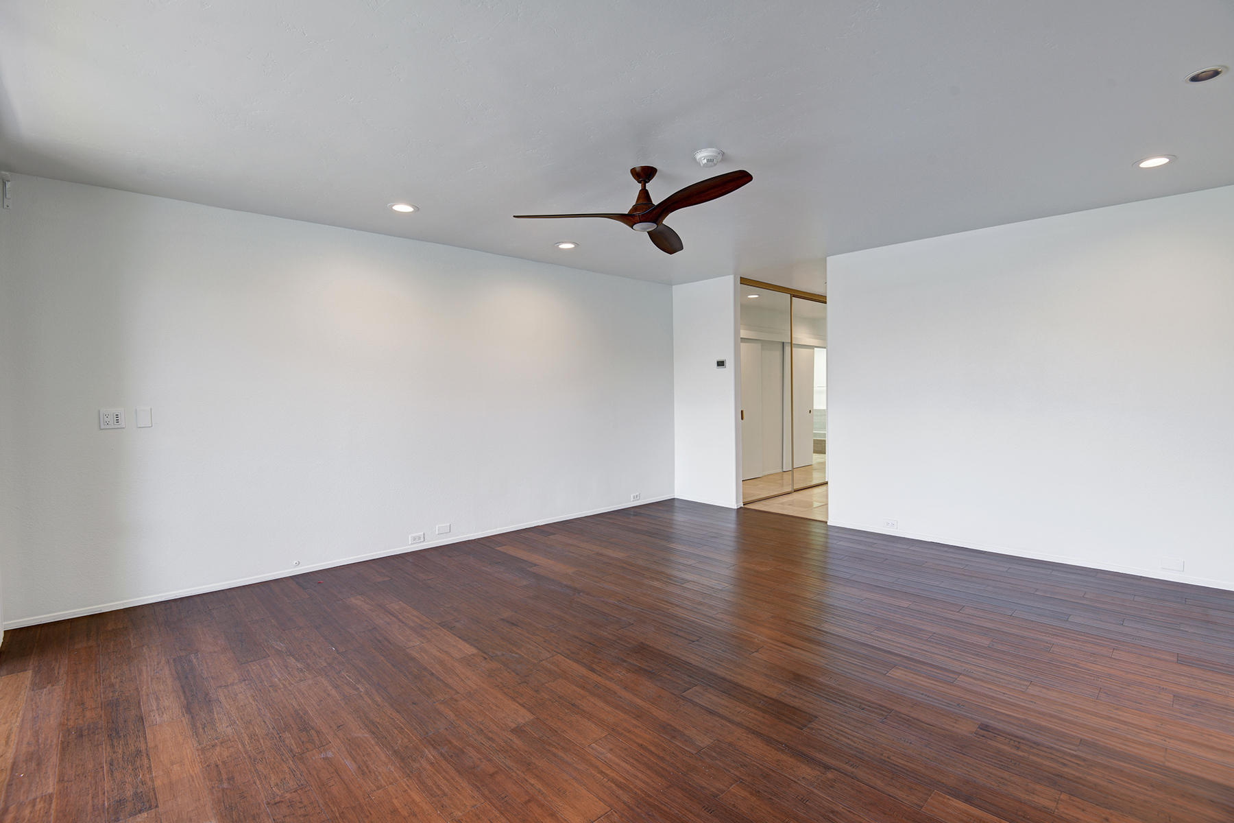 6 Colgate Drive Rancho Mirage, CA 92270 - Photo 11 of 32 a view of empty room with wooden floor