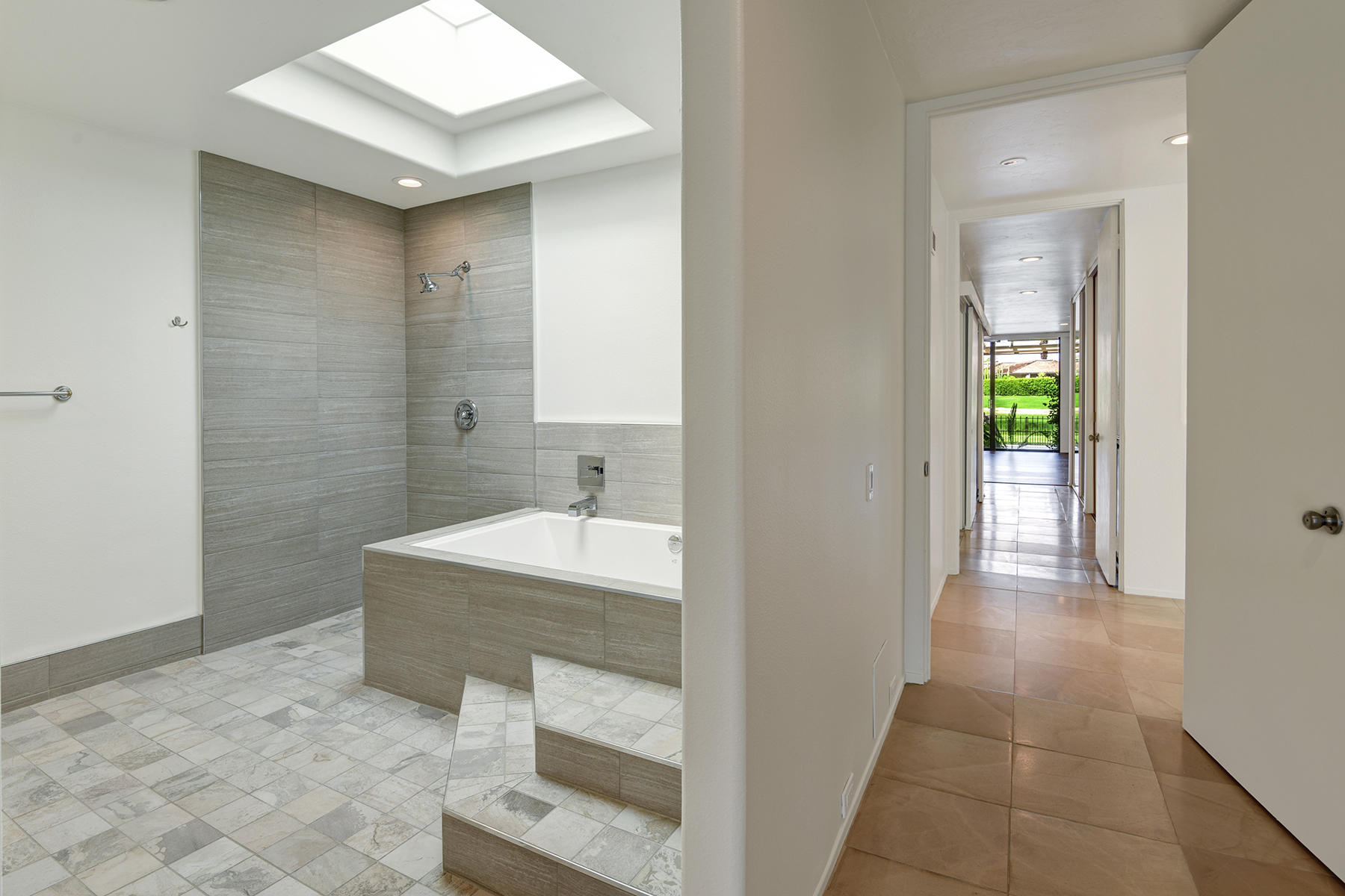 6 Colgate Drive Rancho Mirage, CA 92270 - Photo 18 of 32 a bathroom with a sink and mirror