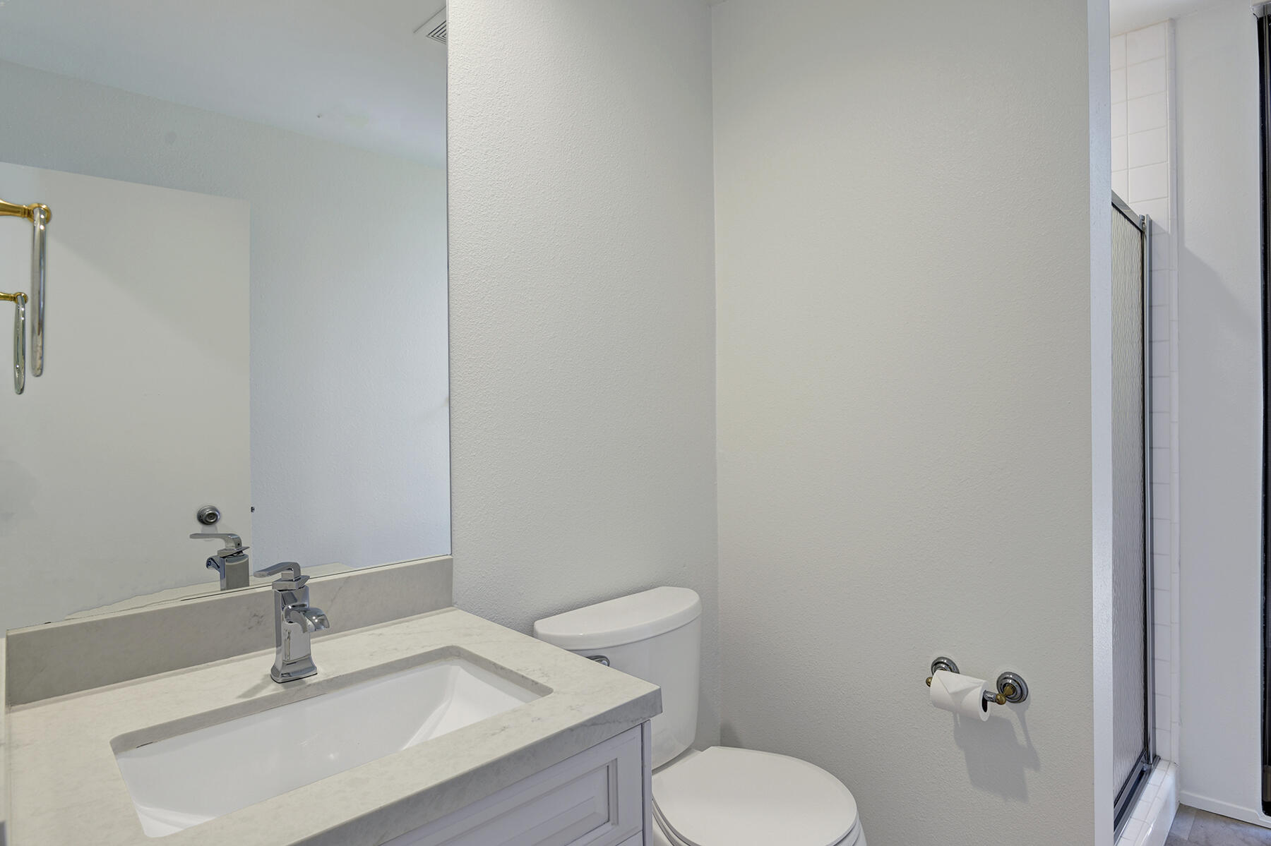 6 Colgate Drive Rancho Mirage, CA 92270 - Photo 19 of 32 a bathroom with a sink toilet and a mirror