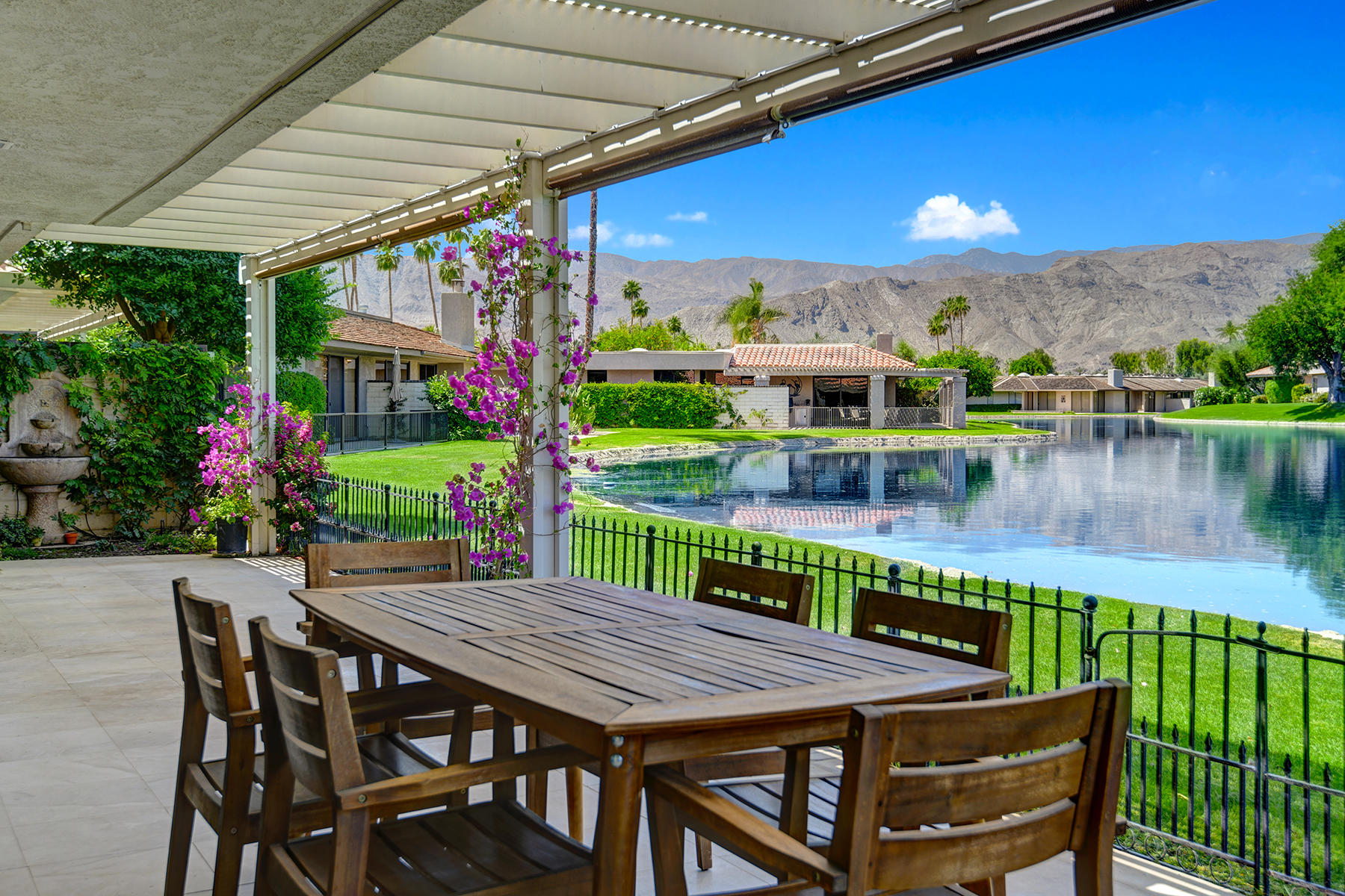 6 Colgate Drive Rancho Mirage, CA 92270 - Photo 22 of 32 a view of a patio with furniture