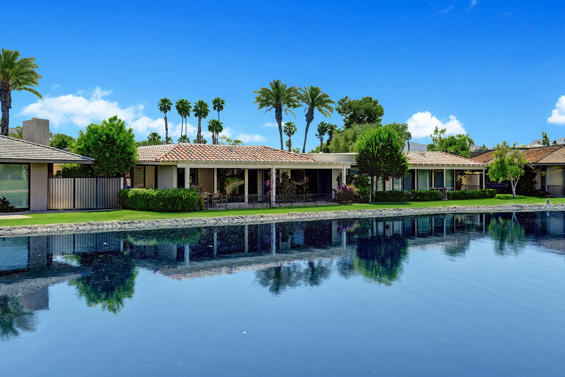 6 Colgate Drive Rancho Mirage, CA 92270 - Photo 26 of 32 a view of a house with a yard
