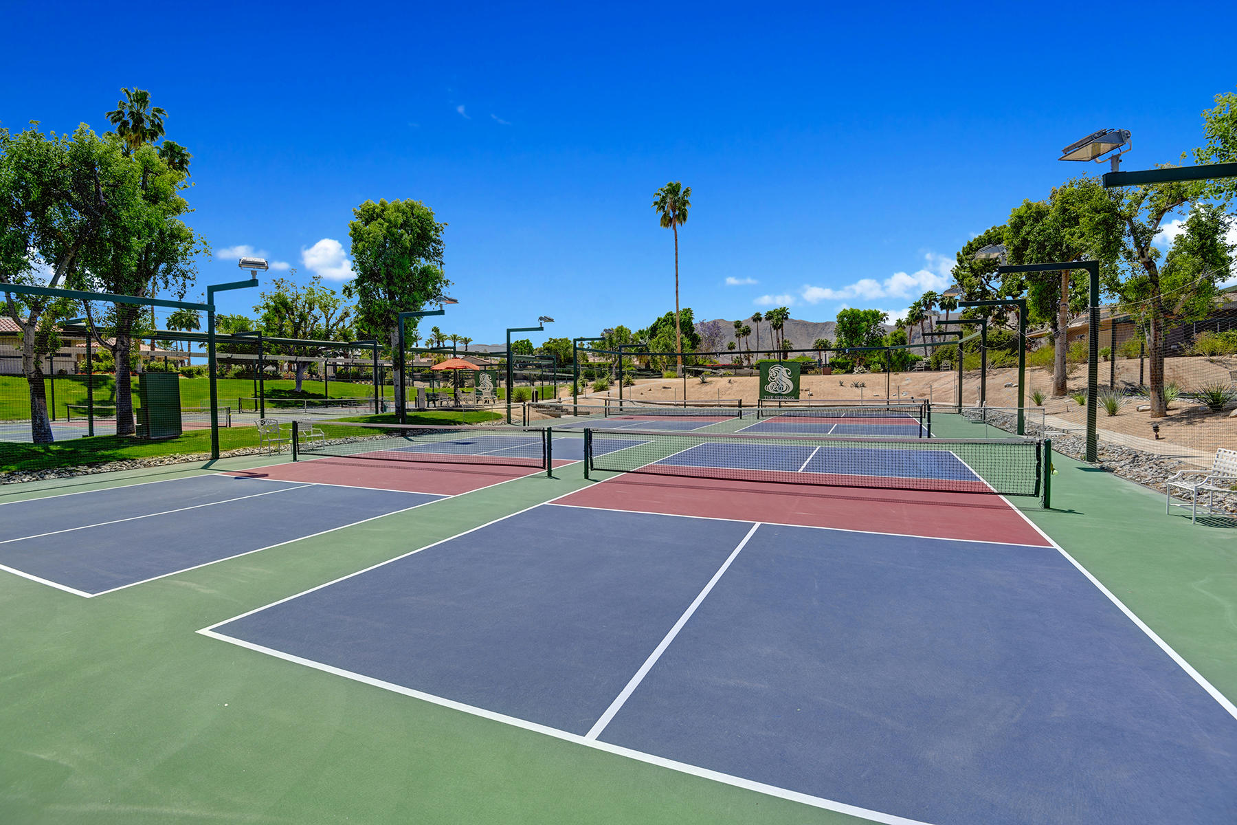 6 Colgate Drive Rancho Mirage, CA 92270 - Photo 29 of 32 a tennis court view