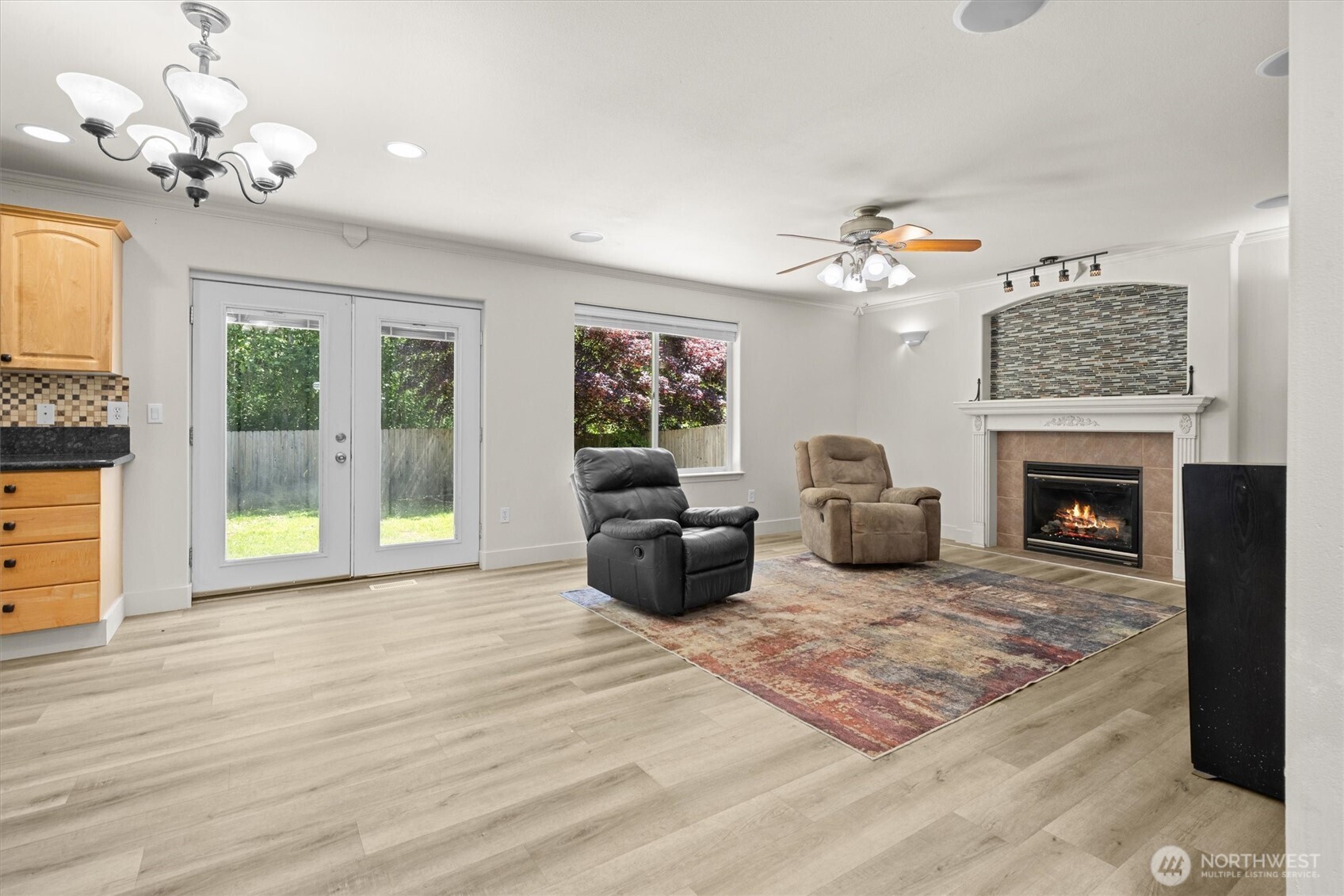13901 Cedar Court Sultan, WA 98294 - Photo 12 of 34 a living room with furniture and a fireplace