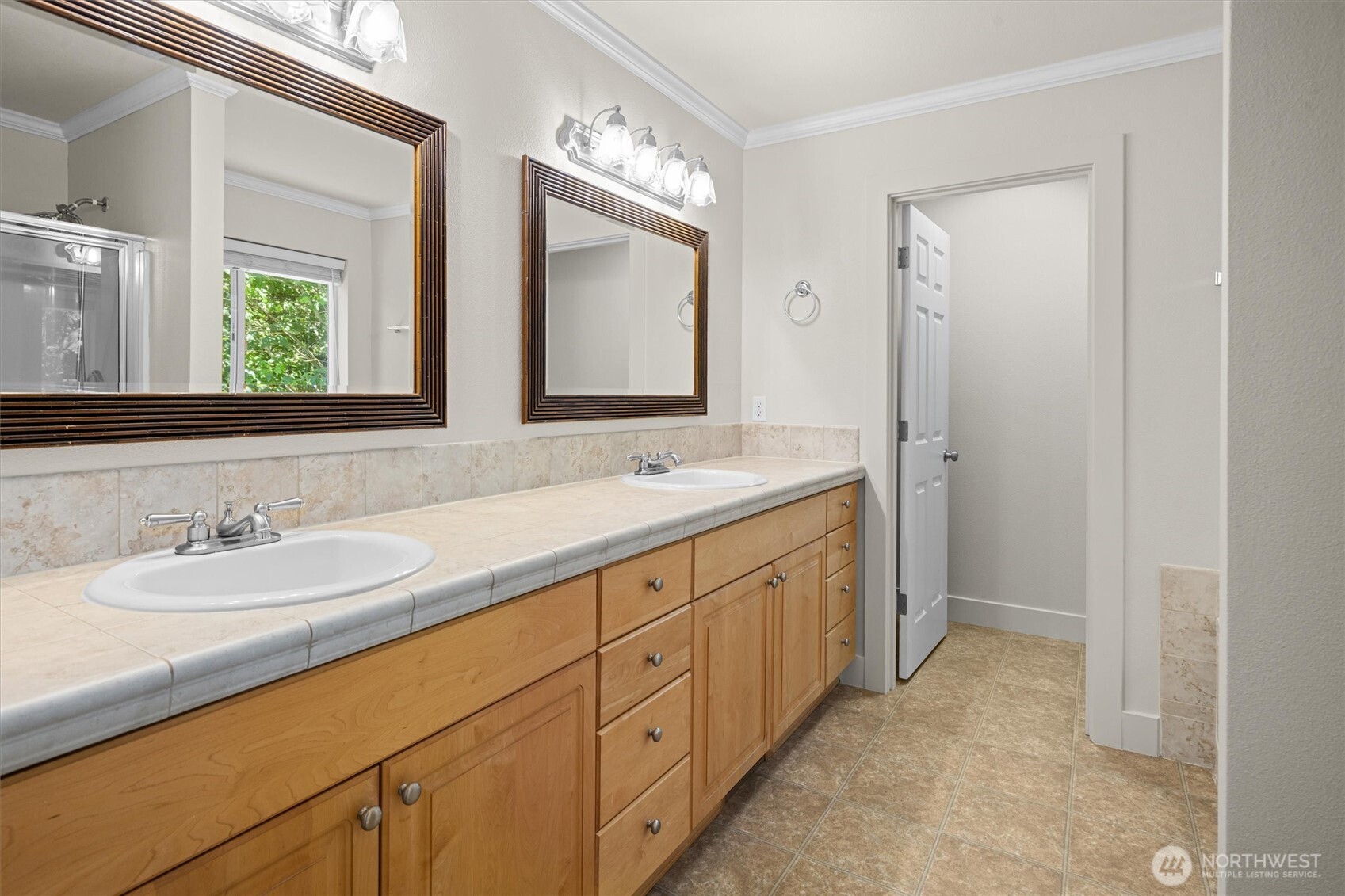 13901 Cedar Court Sultan, WA 98294 - Photo 17 of 34 a spacious bathroom with 2 sink and a mirror