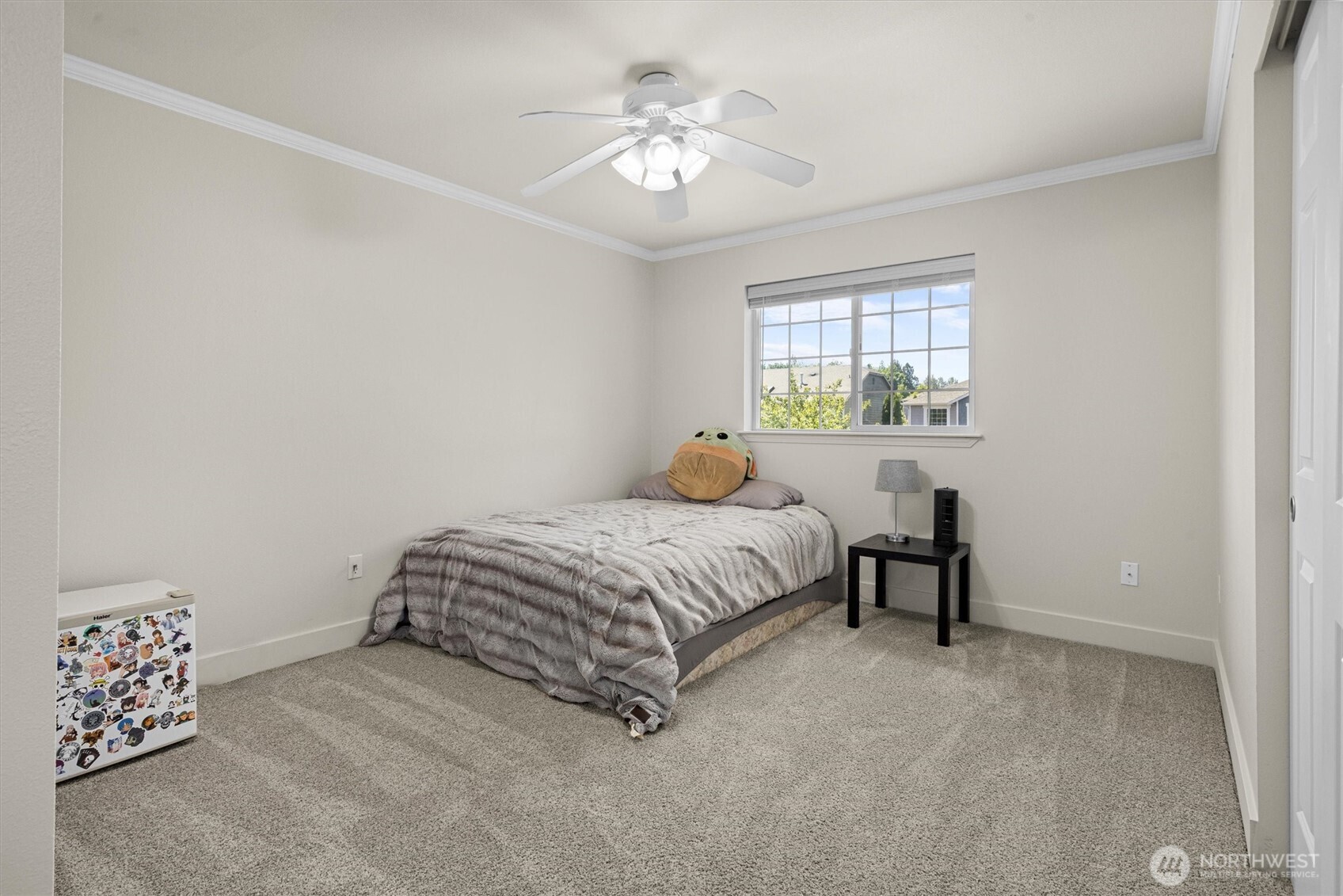 13901 Cedar Court Sultan, WA 98294 - Photo 23 of 34 a spacious bedroom with a bed and a chandelier