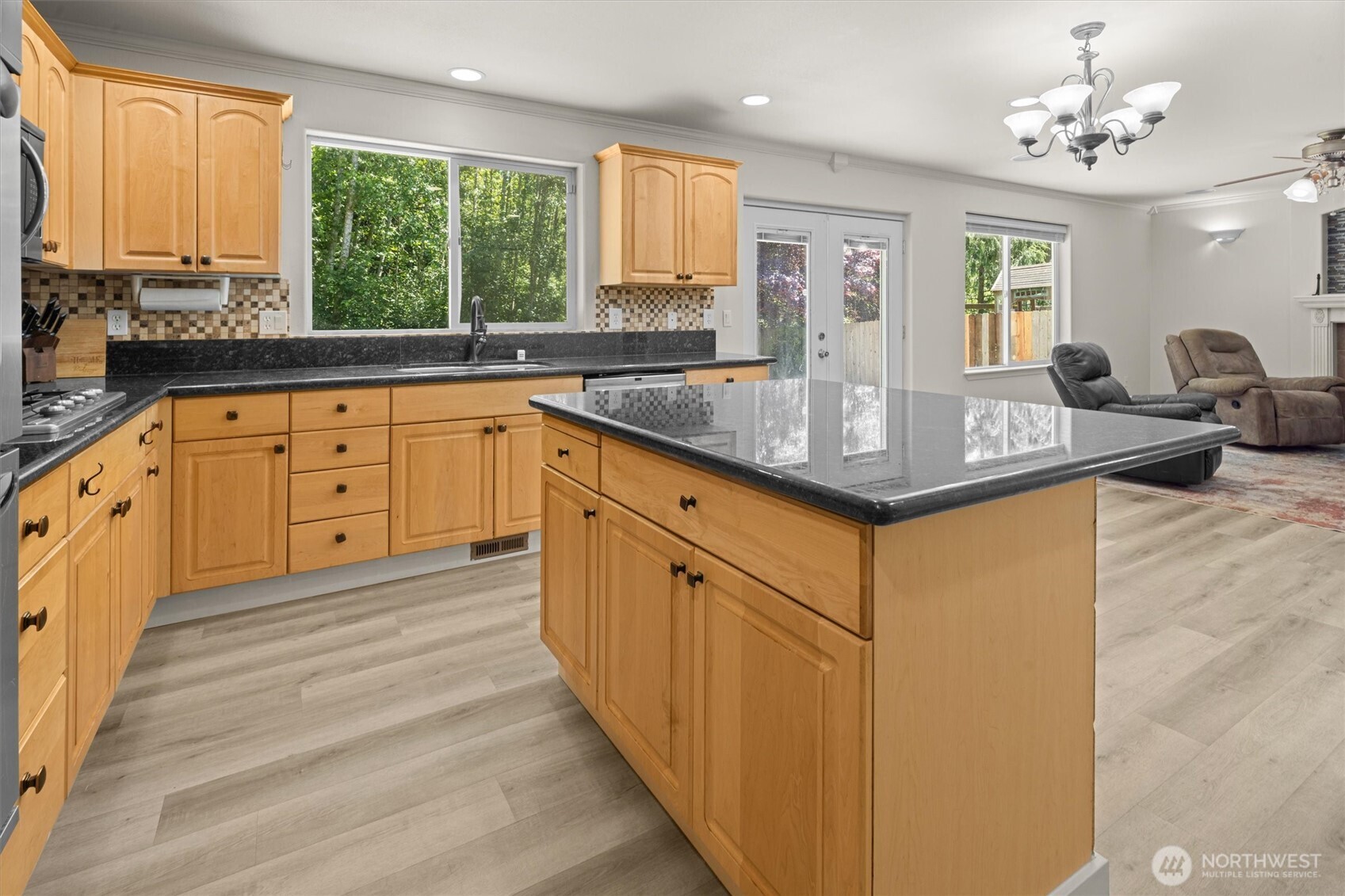13901 Cedar Court Sultan, WA 98294 - Photo 10 of 34 a kitchen with stainless steel appliances granite countertop a sink and cabinets