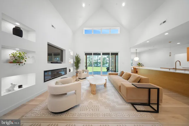 a stove top oven sitting inside of a kitchen