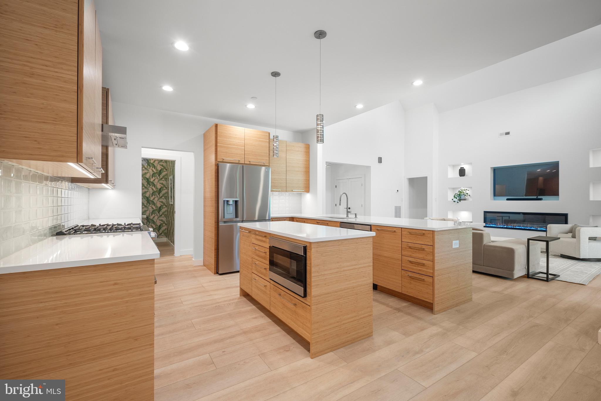 3311 Redden Ferry Road Eden, MD 21822 - Photo 20 of 75 a large kitchen with stainless steel appliances double vanity granite counter tops and a view of living room