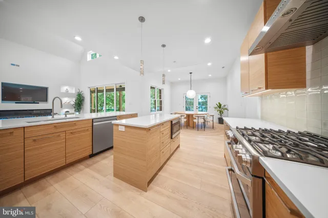 a bathroom with a sink a mirror and bathtub