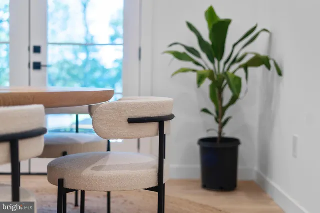 a kitchen with a sink and a mirror