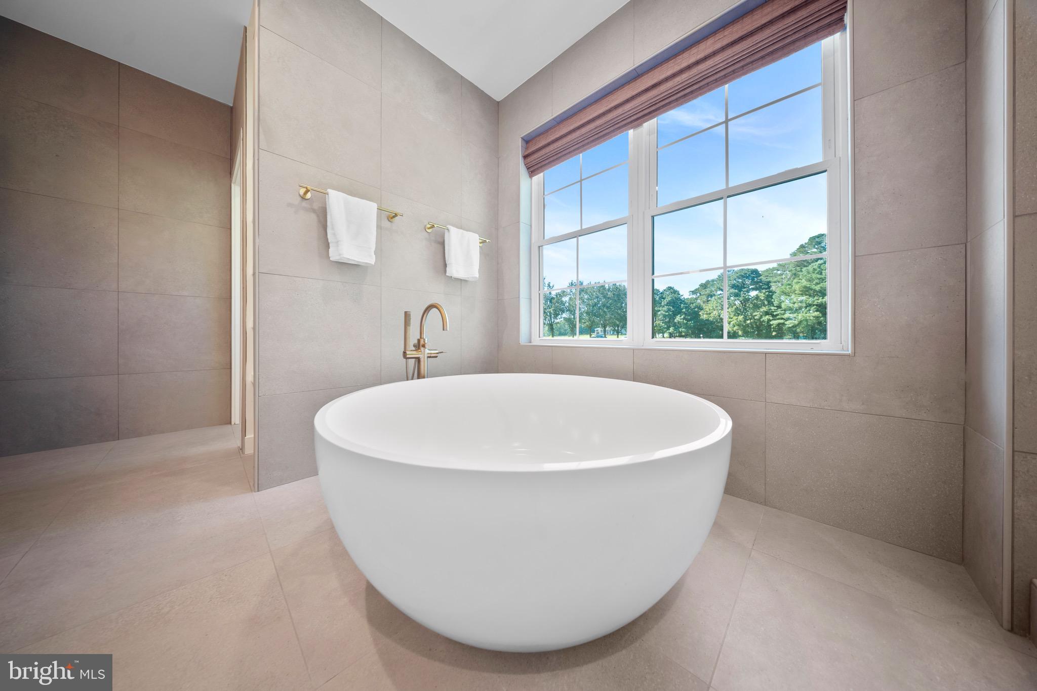 3311 Redden Ferry Road Eden, MD 21822 - Photo 31 of 75 a white bath tub sitting in a bathroom