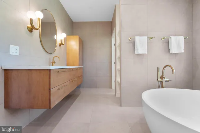 a living room with furniture and white walls