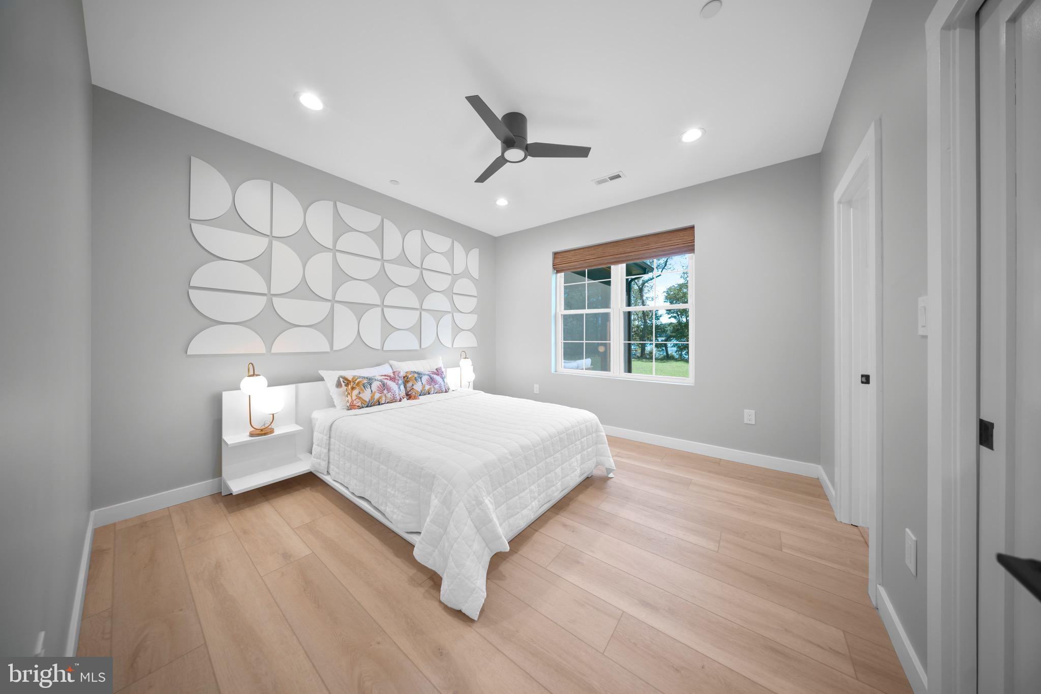 3311 Redden Ferry Road Eden, MD 21822 - Photo 38 of 75 a bedroom with a bed and a window