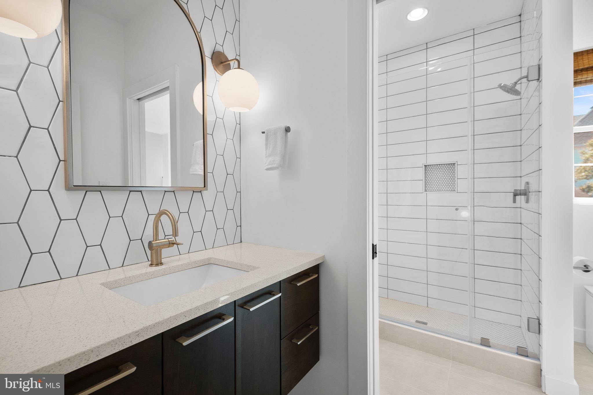 3311 Redden Ferry Road Eden, MD 21822 - Photo 41 of 75 a bathroom with a sink and a mirror