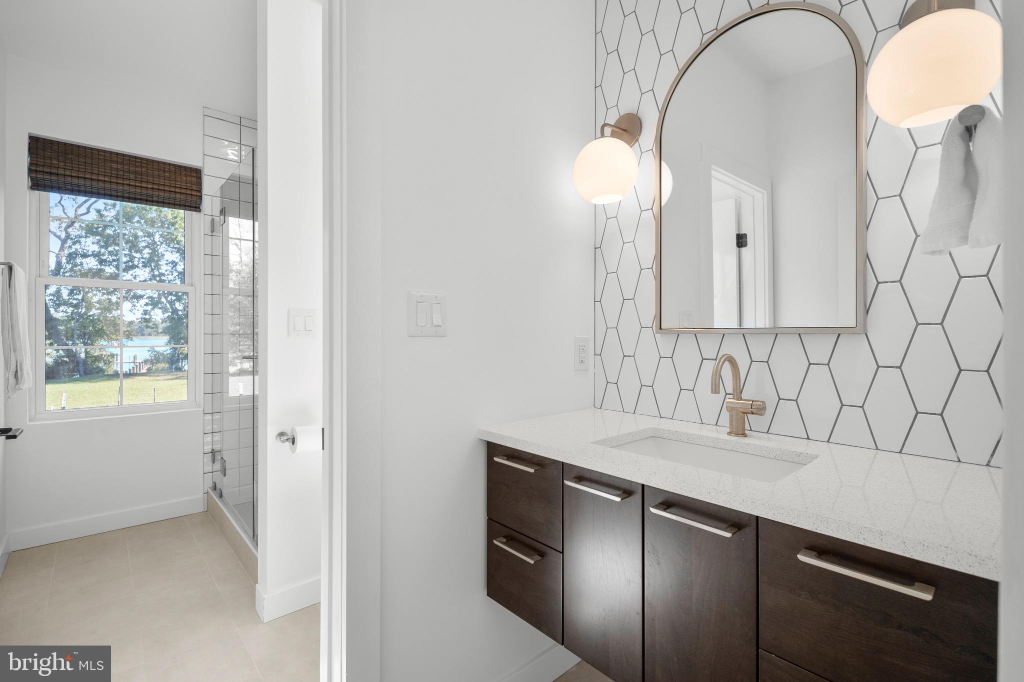 3311 Redden Ferry Road Eden, MD 21822 - Photo 43 of 75 a kitchen with a sink and a mirror