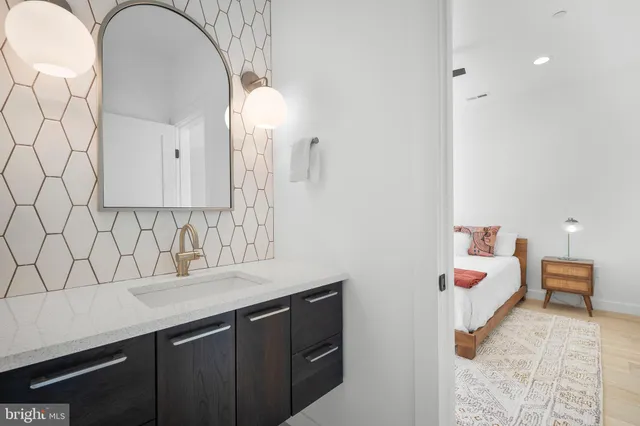 a view of a house with backyard and porch