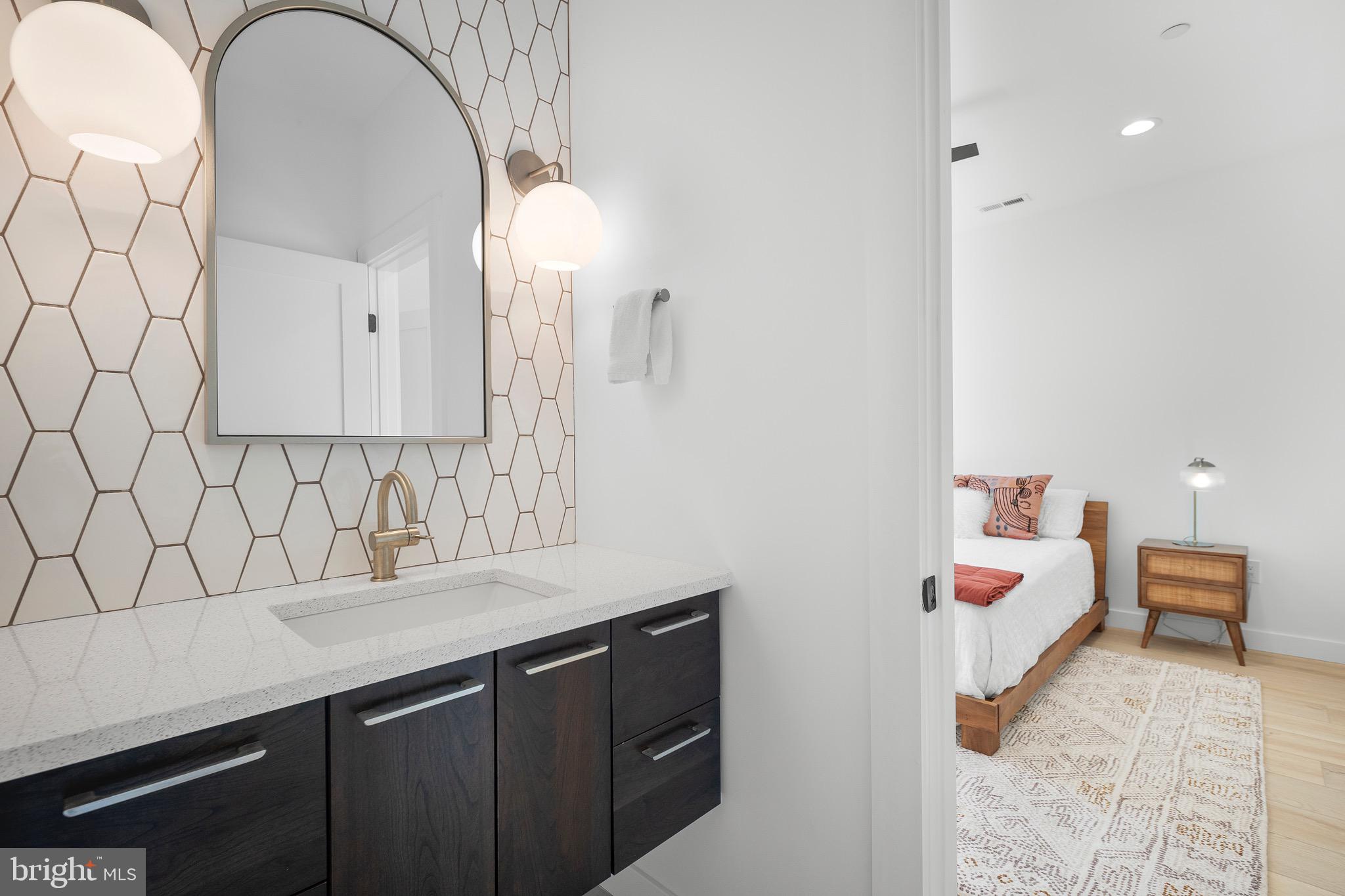 3311 Redden Ferry Road Eden, MD 21822 - Photo 45 of 75 a bathroom with a sink and a mirror