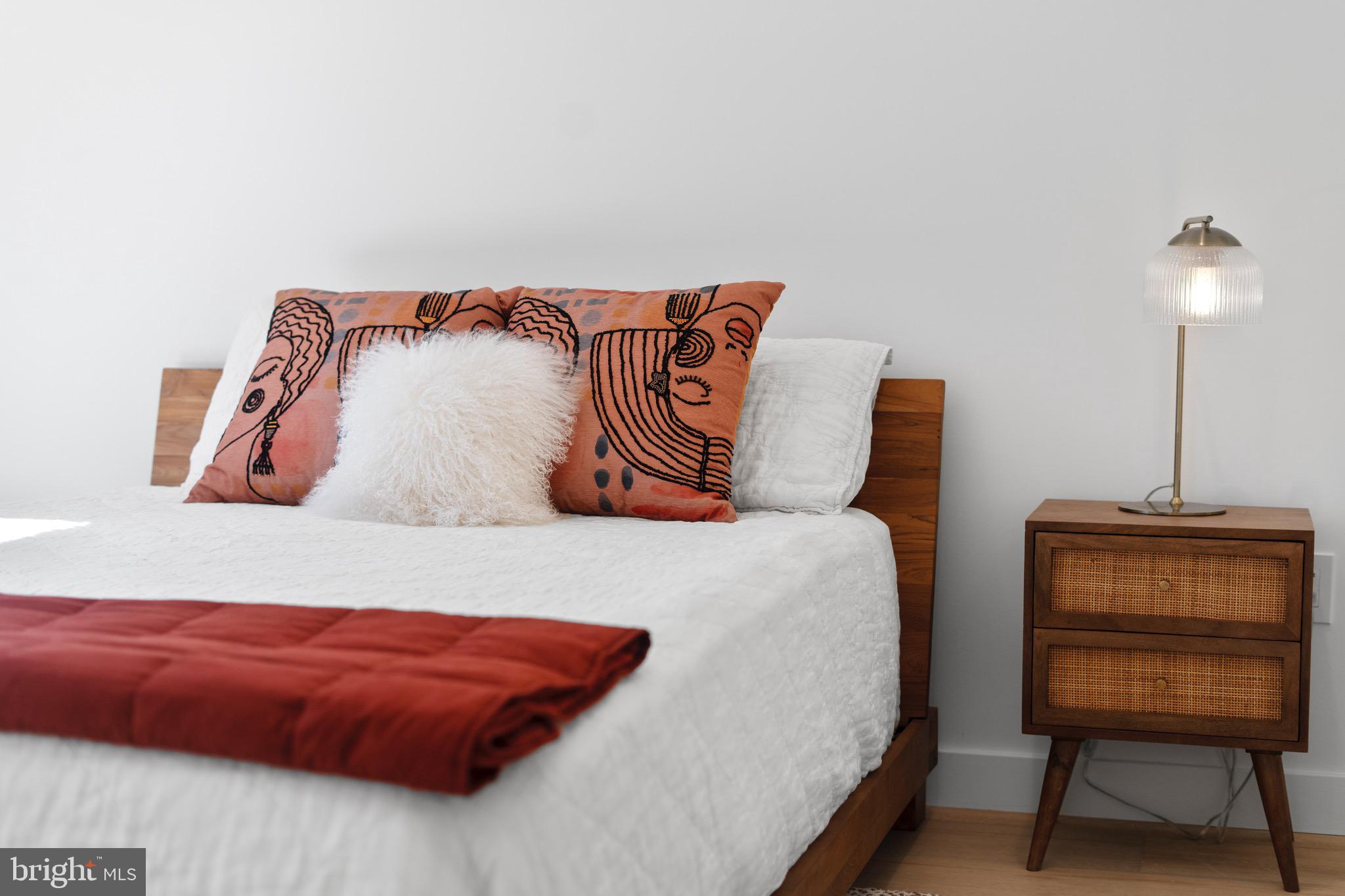 3311 Redden Ferry Road Eden, MD 21822 - Photo 47 of 75 a bedroom with a bed and a chair