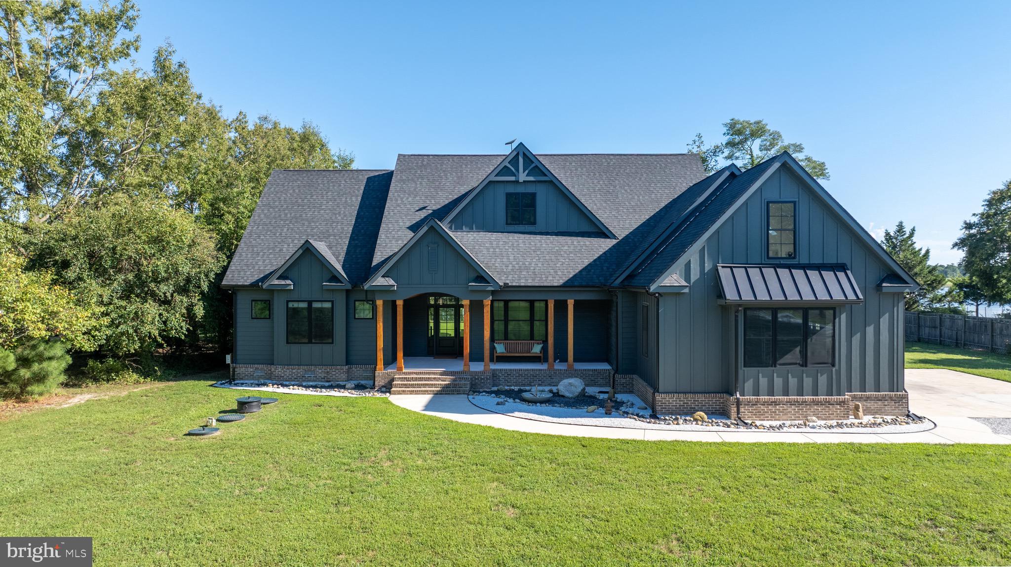 3311 Redden Ferry Road Eden, MD 21822 - Photo 6 of 75 a front view of a house with a yard