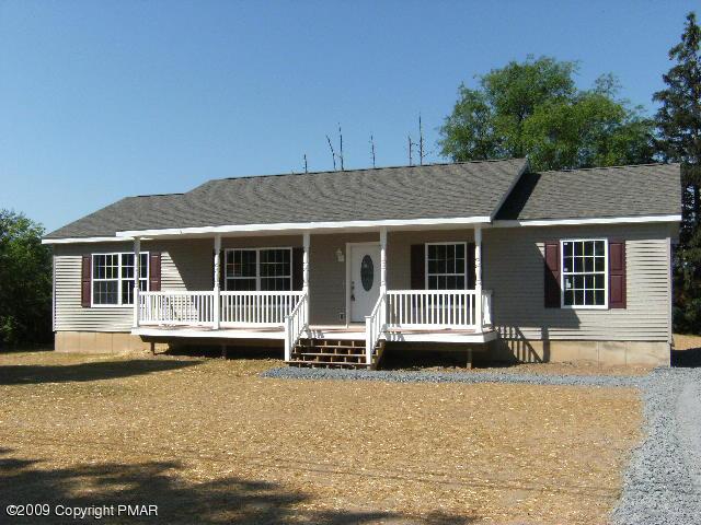 Lot 23 Legion Road Kunkletown, PA 18058 - Photo 1 of 14 a front view of a house with a yard