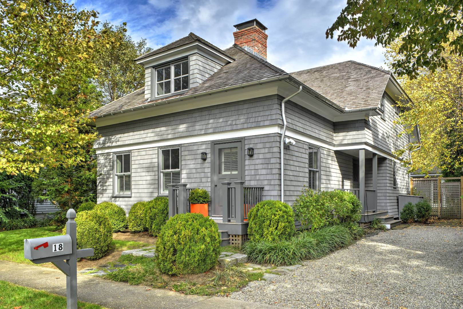 18 Glover Street Sag Harbor, NY 11963 - Photo 2 of 26 a front view of a house with garden