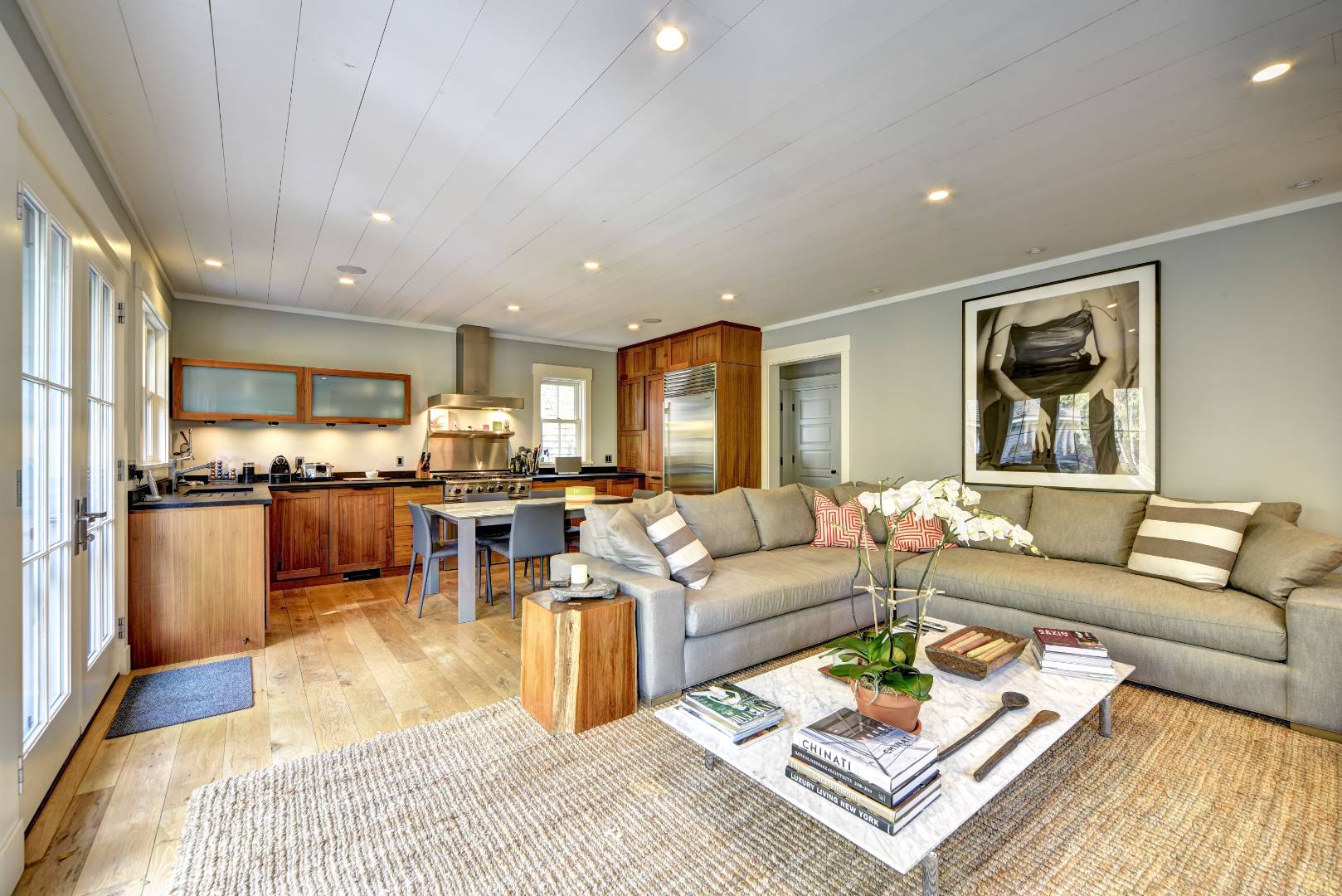 18 Glover Street Sag Harbor, NY 11963 - Photo 11 of 26 a living room with furniture kitchen and a table