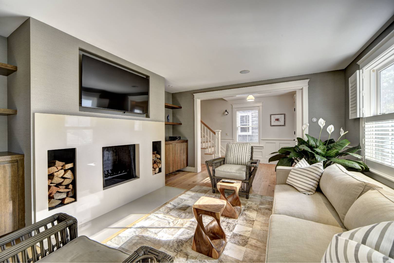 18 Glover Street Sag Harbor, NY 11963 - Photo 14 of 26 a living room with furniture fireplace and flat screen tv