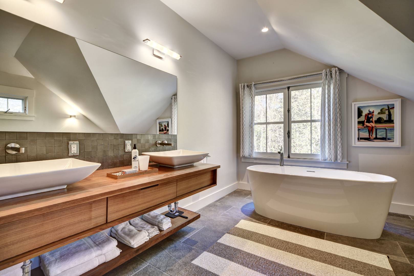 18 Glover Street Sag Harbor, NY 11963 - Photo 19 of 26 a living room with furniture and a table