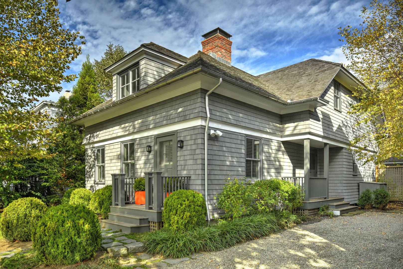 18 Glover Street Sag Harbor, NY 11963 - Photo 3 of 26 a front view of a house with garden