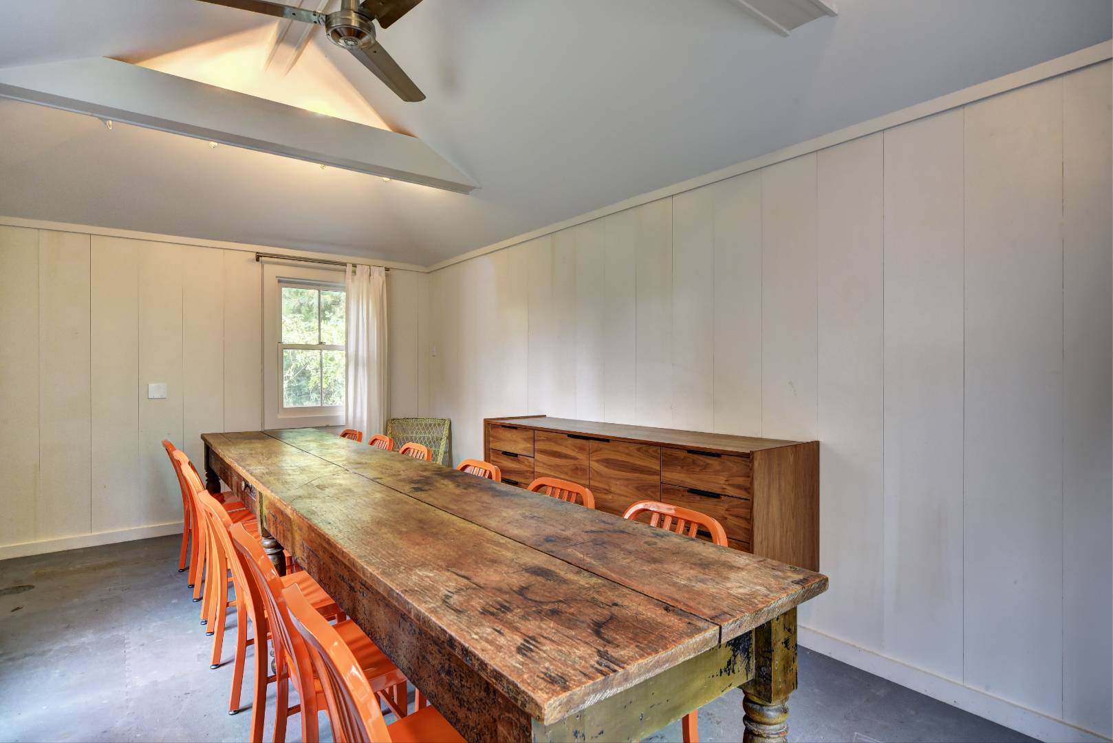 18 Glover Street Sag Harbor, NY 11963 - Photo 25 of 26 a wooden floor with a table and chairs in it