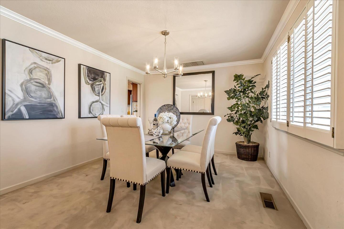 18809 Cabernet Drive Saratoga, CA 95070 - Photo 5 of 29 a view of a dining room with furniture and a window