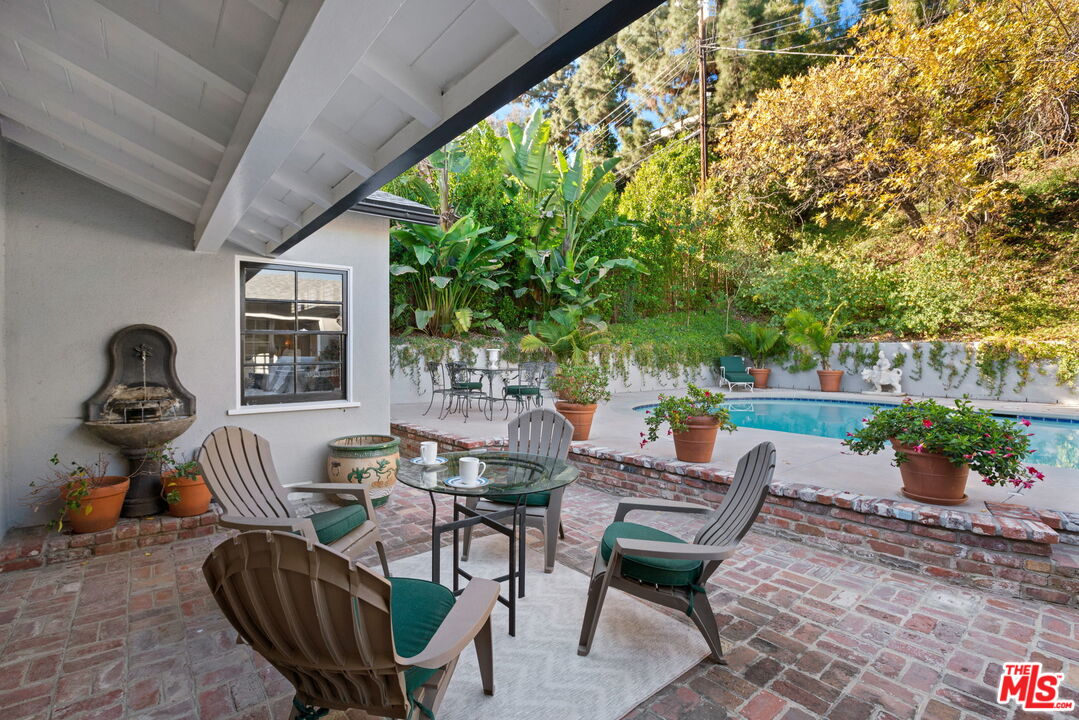 3733 Wrightwood Drive Studio City, CA 91604 - Photo 43 of 49 a backyard of a house with seating space